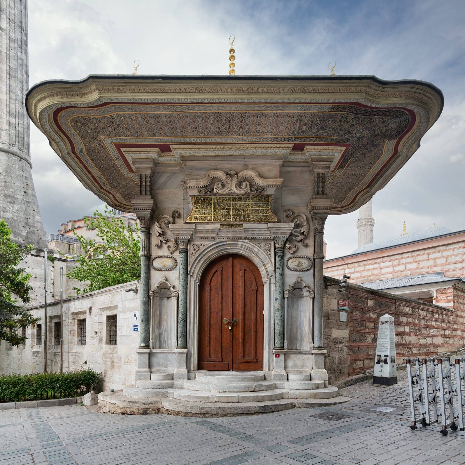 Entrance to Carpet Museum in Istanbul, Turkey, in the Sultanahmet neighborhood, few steps away from the Hagia Sophia. Entrance has a pointed arch and flanked by two columns with Corinthian capitals