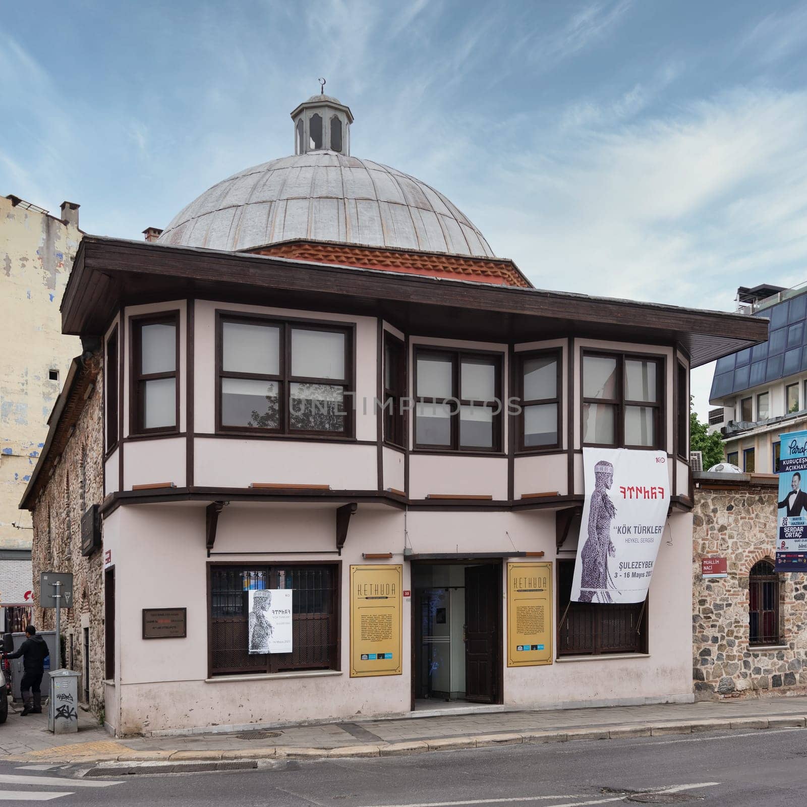 Istanbul, Turkey - May 12 2023: 17th century historic Husrev Kethuda Hamami, a Turkish bathhouse located in the Ortakoy district. The building is made of white stone and has a large dome in the center