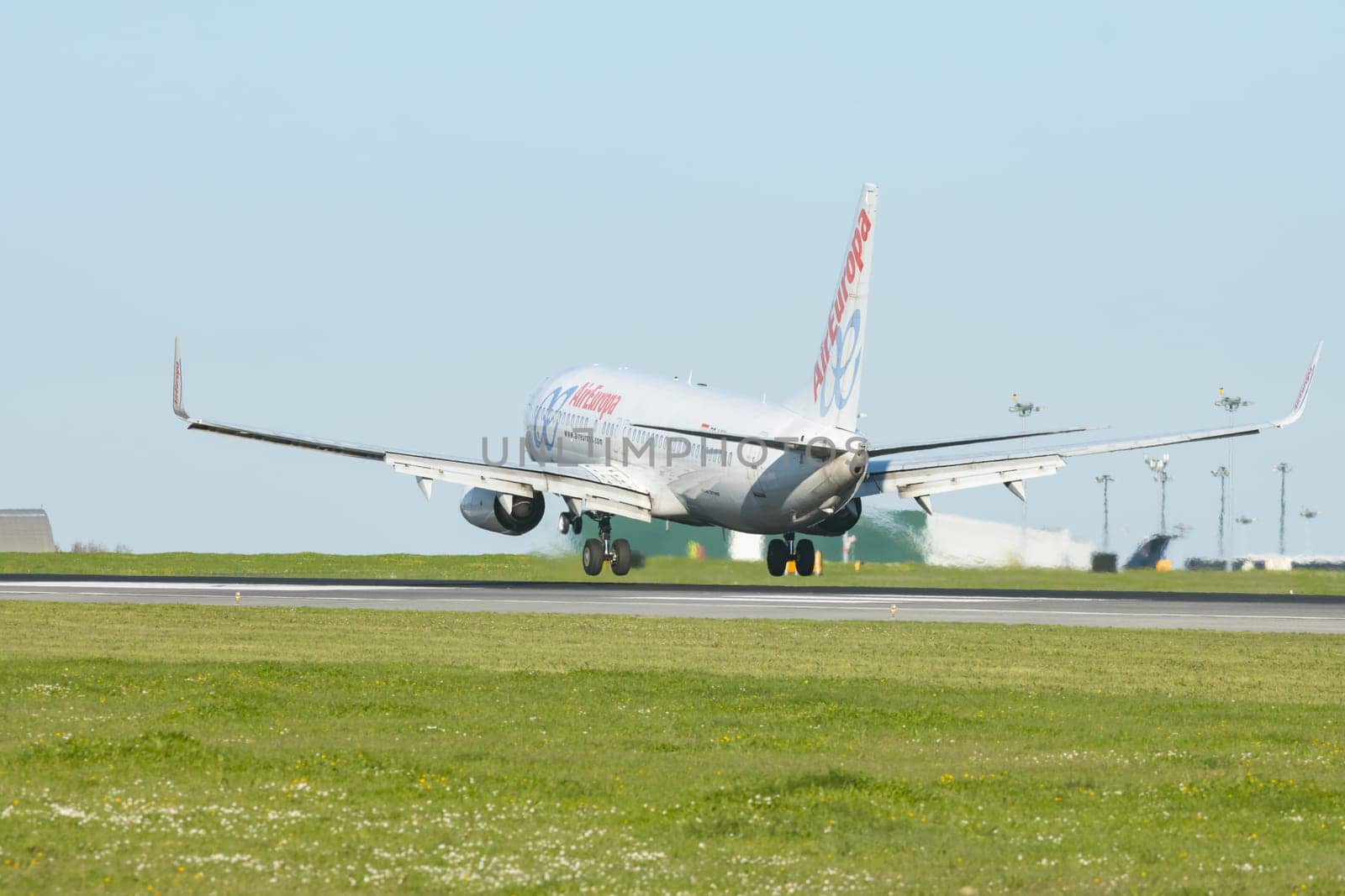 1 December 2022 PORTUGAL, LISBON: AIREUROPE airplane on the runway. Mid shot
