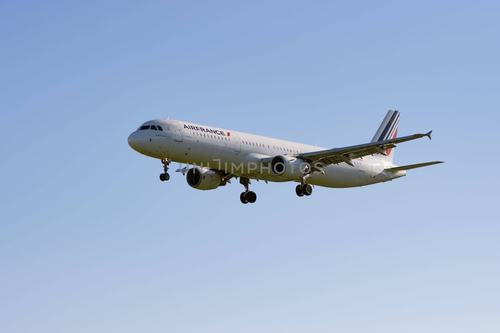 1 December 2022 PORTUGAL, LISBON: AIRFRANCE passenger plane flies in the sky. Mid shot