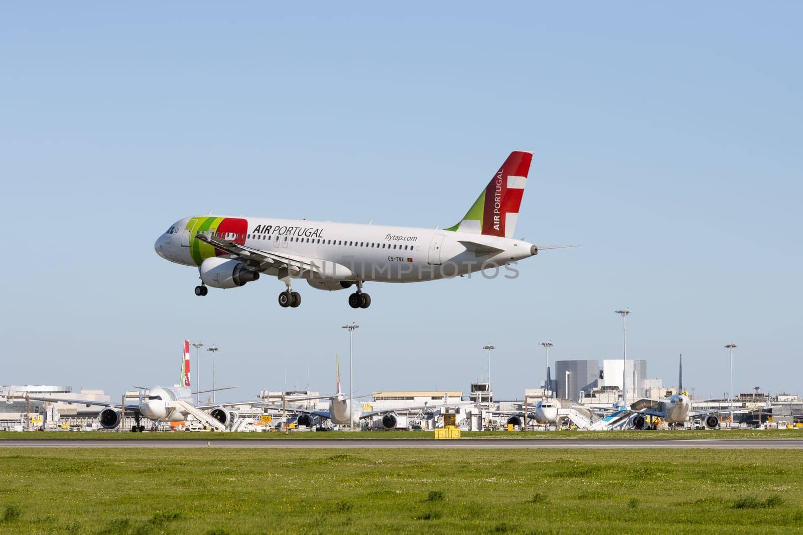 1 December 2022 PORTUGAL, LISBON: AIRPORTUGAL CS-TNX passenger plane took off the runway. Mid shot