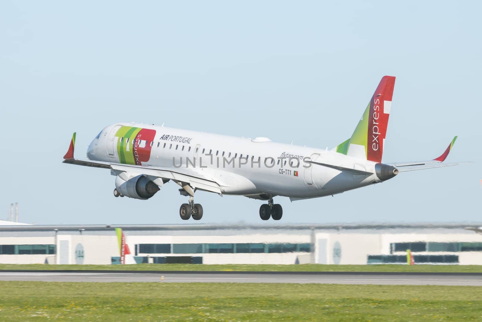1 December 2022 PORTUGAL, LISBON: AIRPORTUGAL CS-TTY passenger plane took off the runway. Mid shot