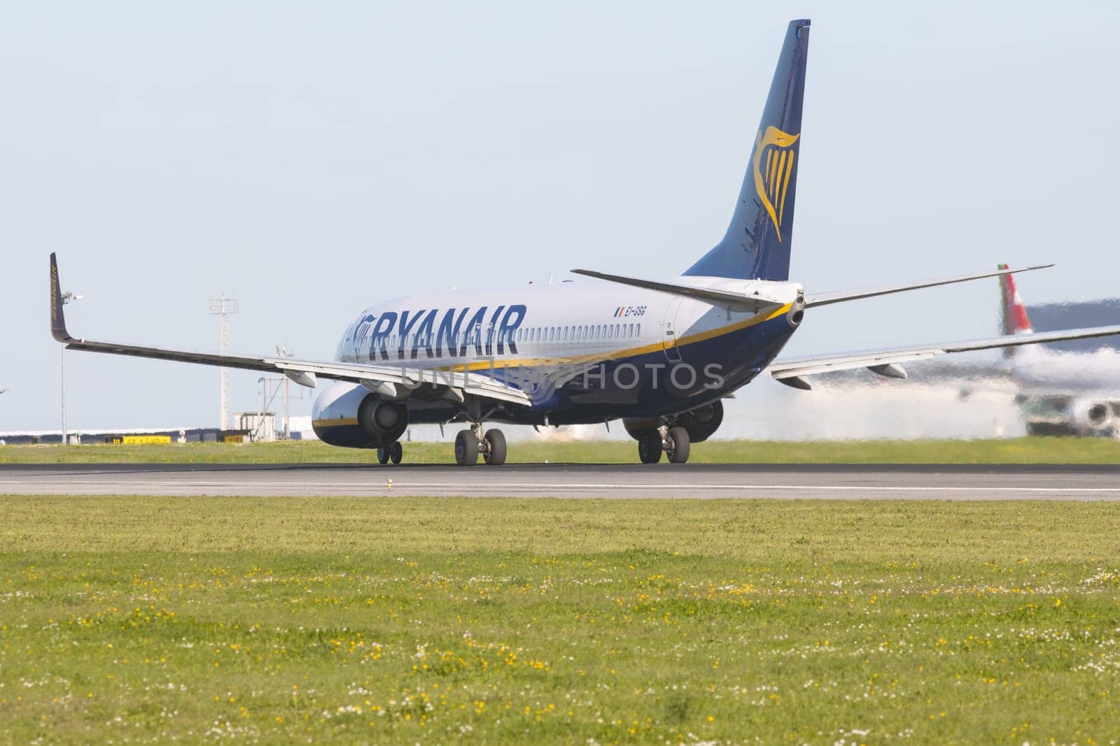 1 December 2022 PORTUGAL, LISBON: RYANAIR passenger plane on the runway. Mid shot