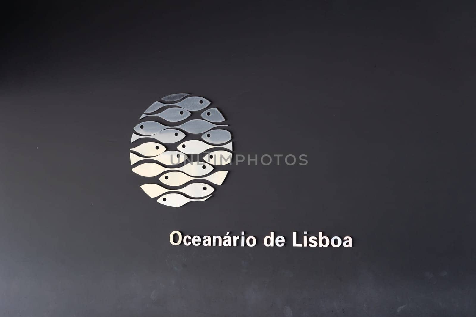 PORTUGAL, LISBON 12 December 2022: Lisbon Oceanarium logo on a black wall. Mid shot