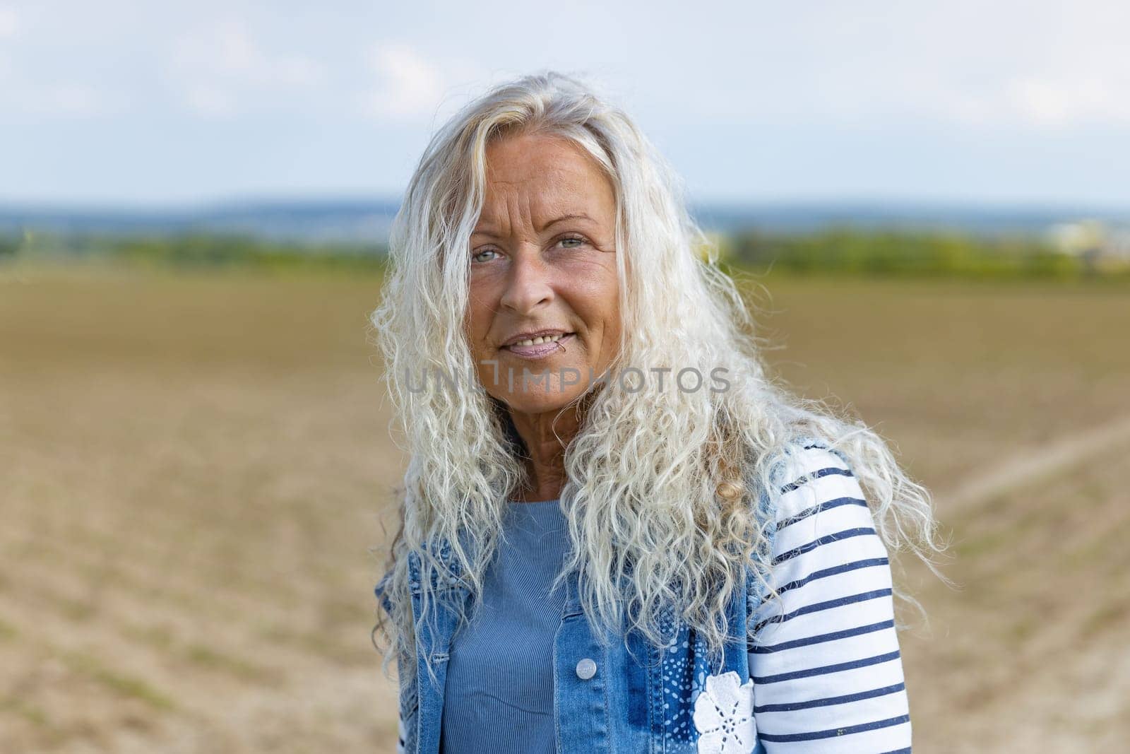 Portrait from happy caucasian woman with piercing