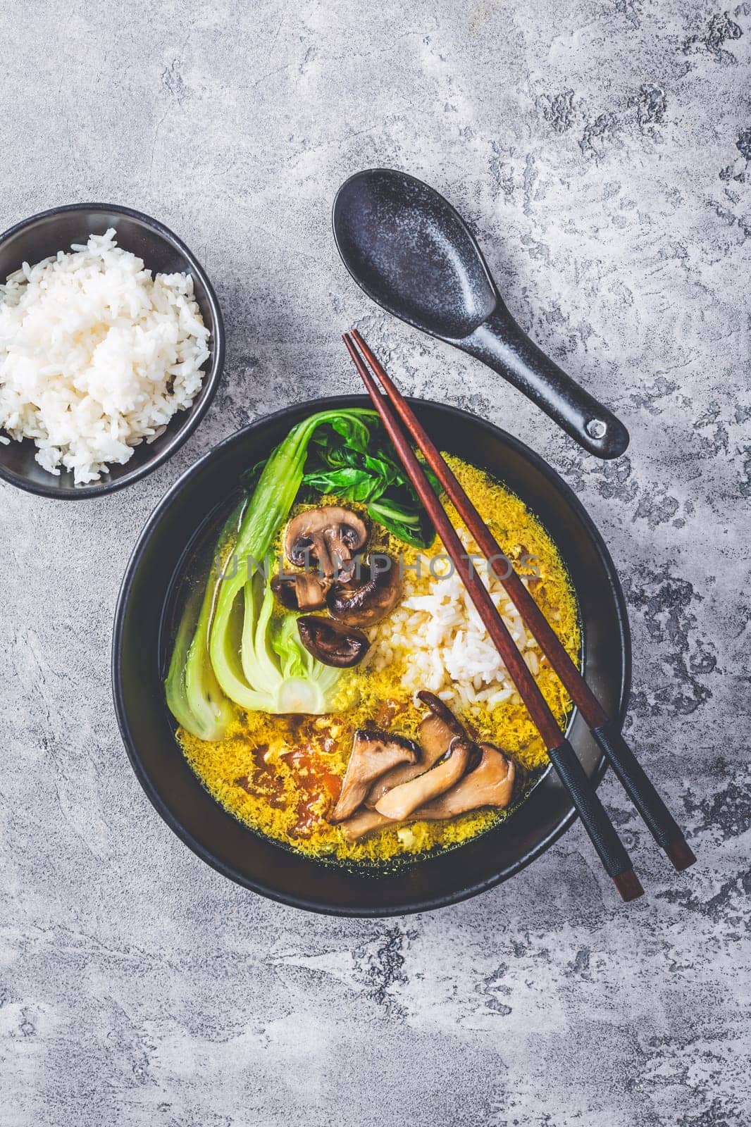 Egg flower soup, tomato egg drop soup with mushrooms, bok choy and rice. Asian cuisine