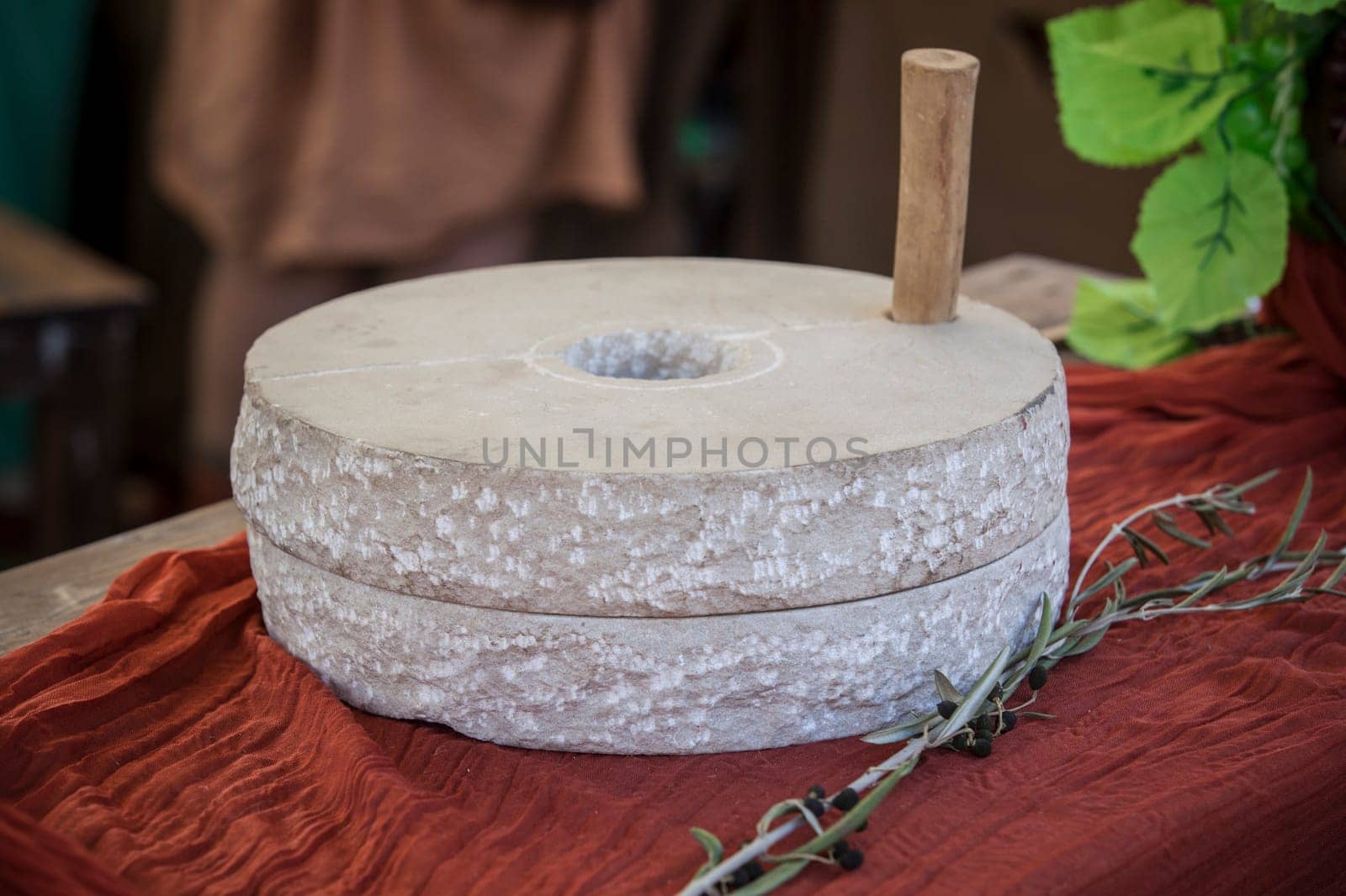 Hand mill stone or mola manuaria, portable mill used in ancient roman times