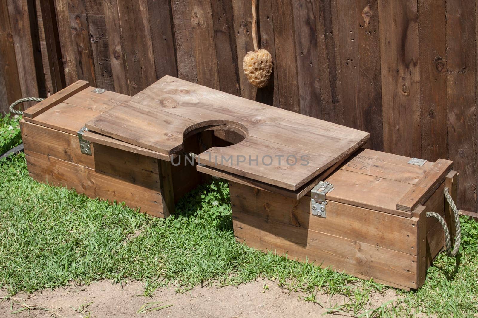 Latrine plank placed over two camp wooden boxes. Ancient roman military life