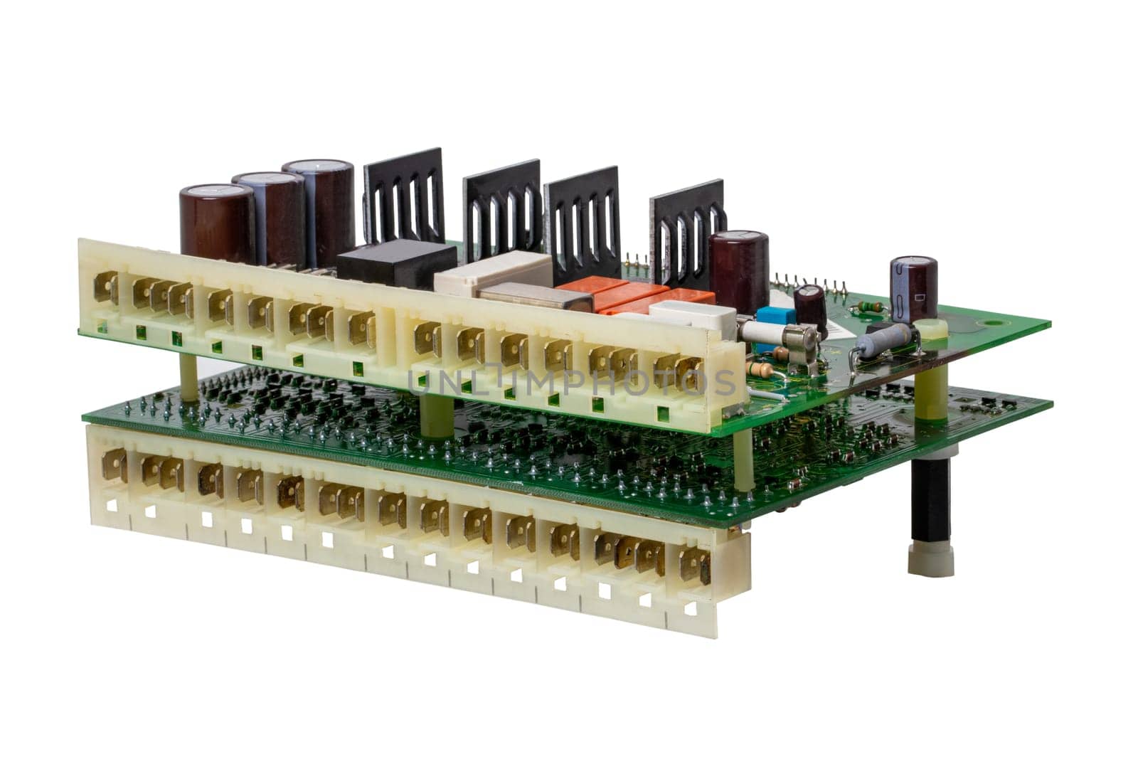 Gas boiler repair. Close-up of Control centre of a condensing gas heating system isolated on a white background. Clipping path. Heat sink on circuit board.