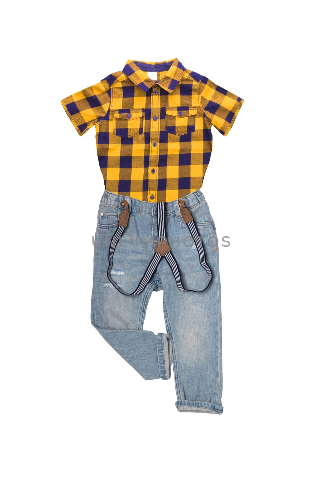 Collage set of a trendy stylish blue denim pants or trousers for boys and a brown yellow checkered t-shirt with short sleeves isolated. Kids summer fashion.