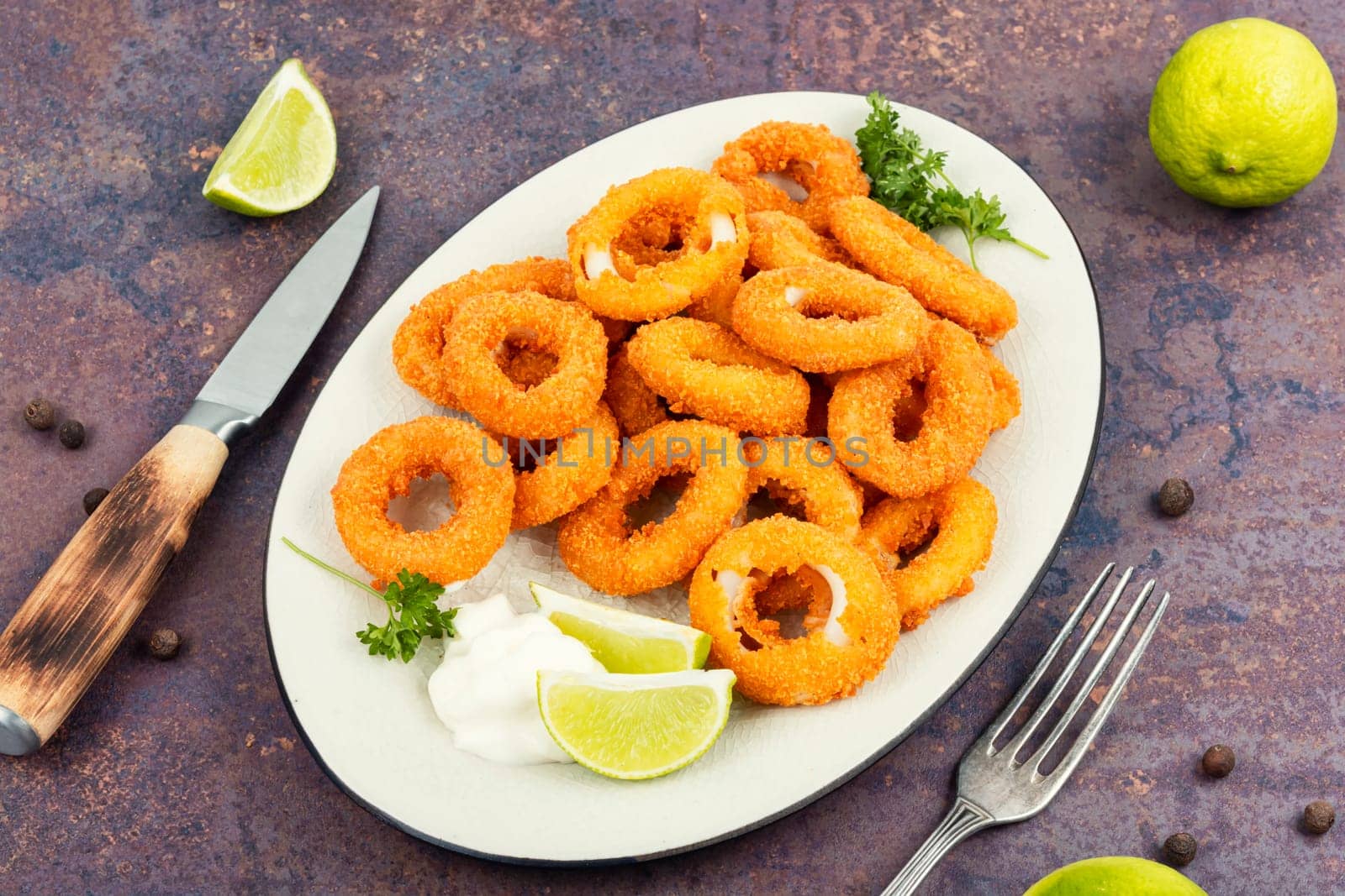 Deep fried calamari or squid rings. Top view
