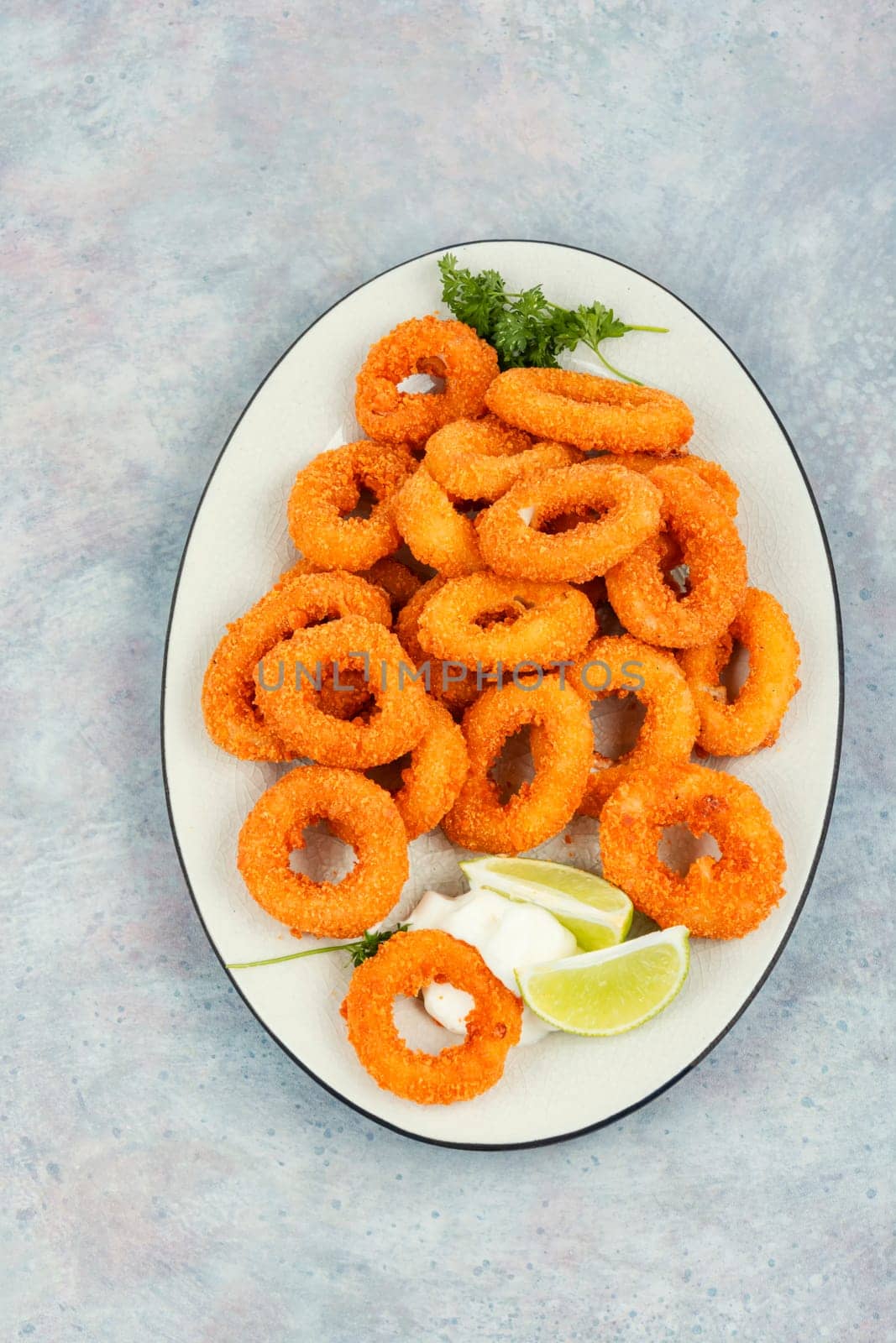 Deep fried calamari or squid rings. Top view