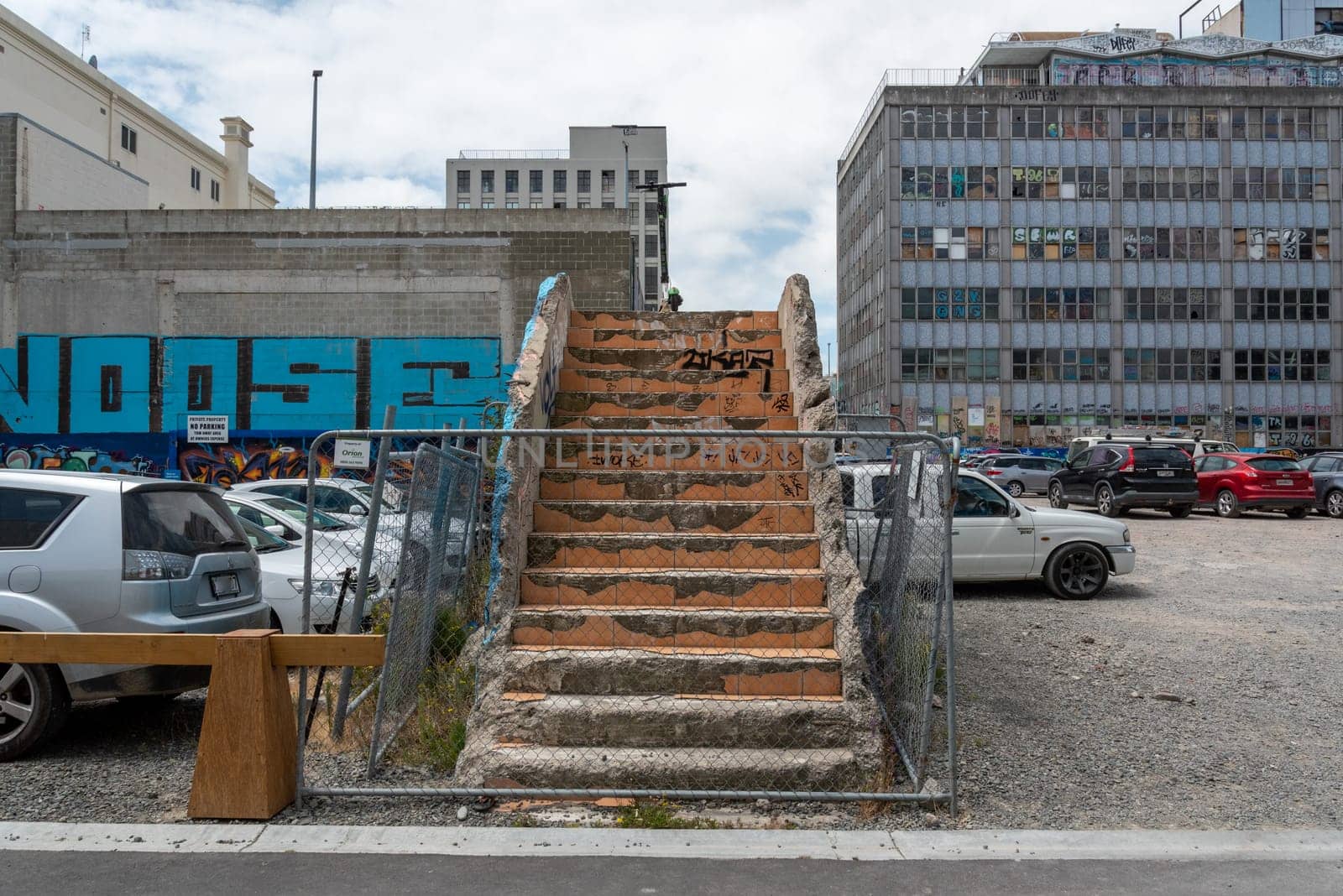 CHRISTCHURCH, NEW ZEALAND - DECEMBER 16, 2022 - Stairs leading nowhere, remains of a building destroyed by the 2011 earthquake, Christchurch, New Zealand