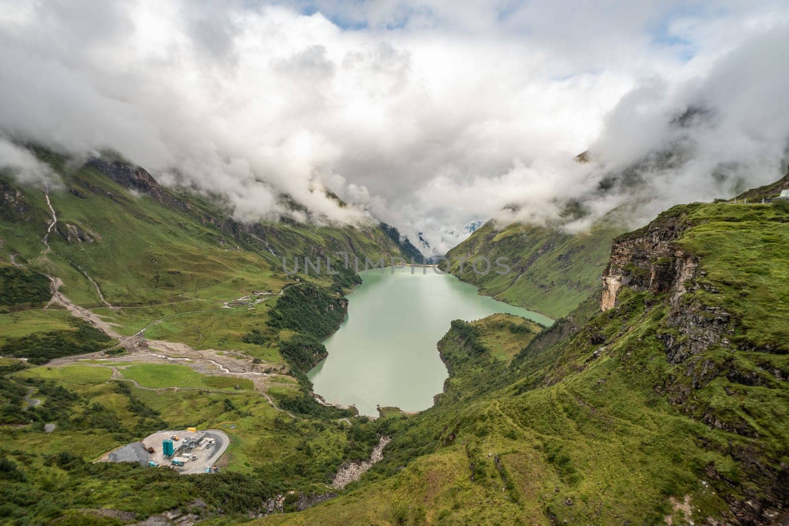 Scenic panoramic view from the reservoirs and its alpine landscape near Kaprun in the Austrian Alps