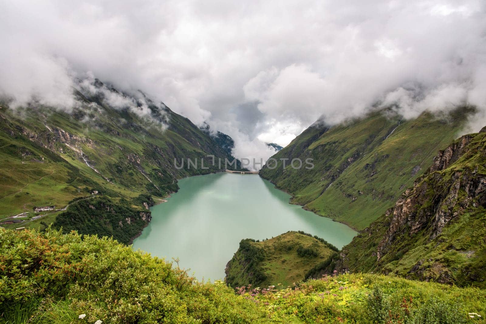 Scenic panoramic view from the reservoirs and its alpine landscape near Kaprun in the Austrian Alps