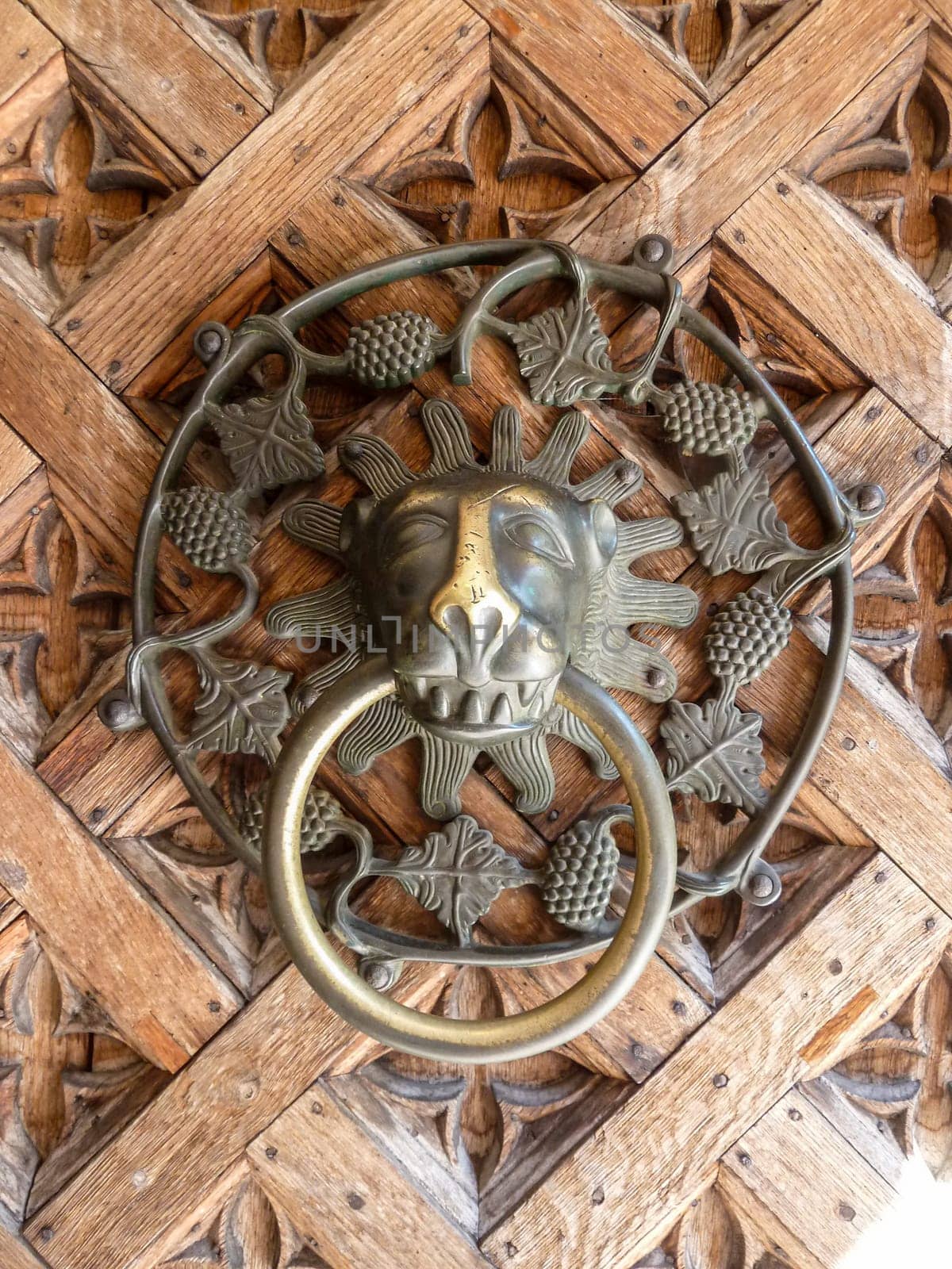 MALBORK, POLAND - SEPTEMBER 03, 2020 - Door knocker in the castle of the Teutonic Order in Malbork, Poland