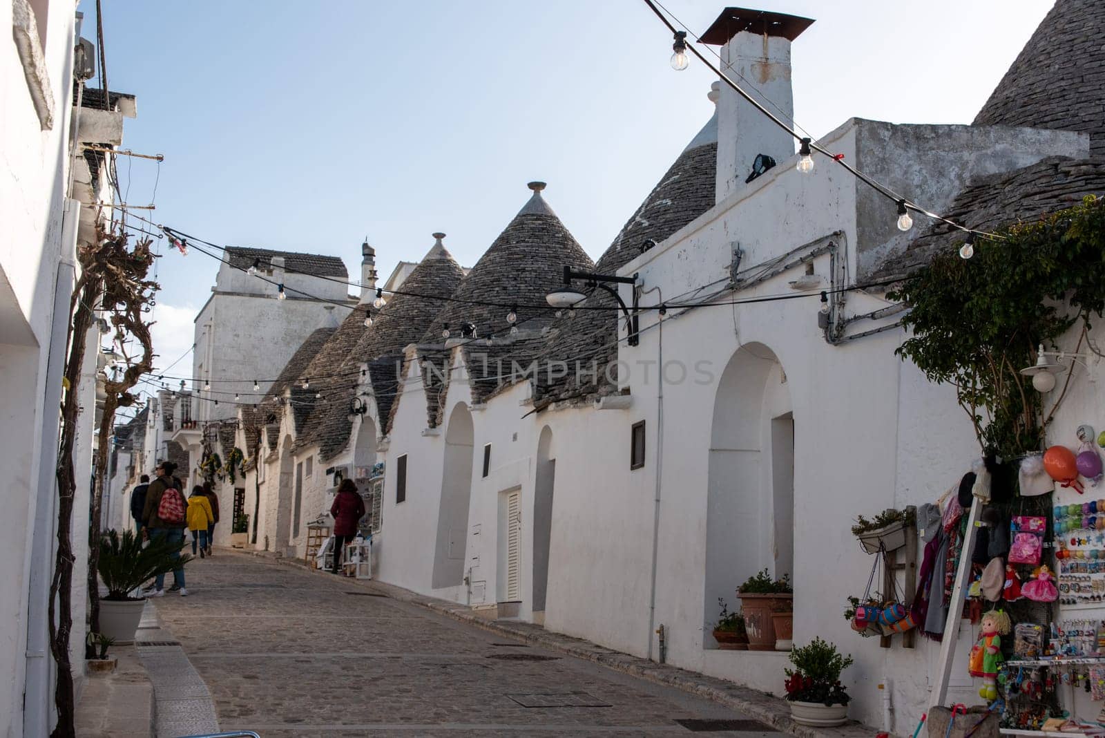 Iconic residential houses in historic Trulli district in Alberobello, Italy