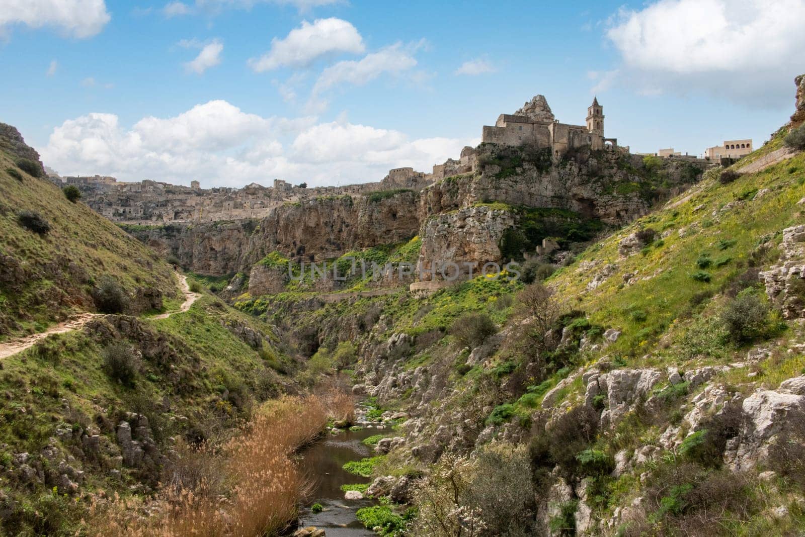 Hiking through the canyon in Matera, Italy