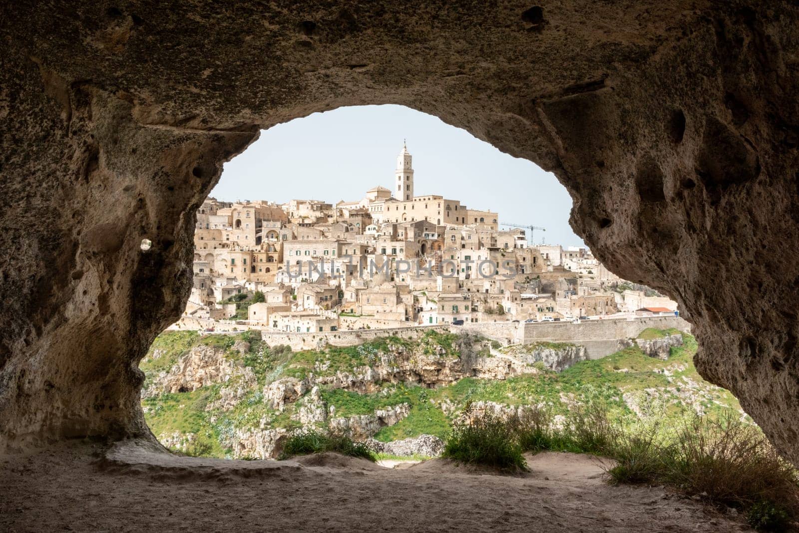 Scenic view of historic downtown with its cathedral, photo taken from a cave house, Italy