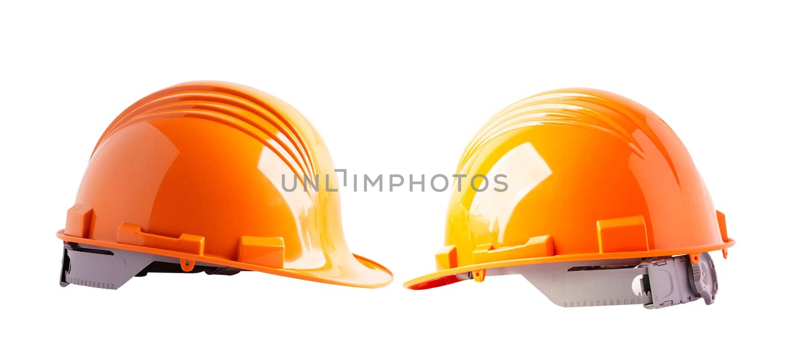 Orange and orange helmet isolated on white background protect to safety for engineer in construction site.