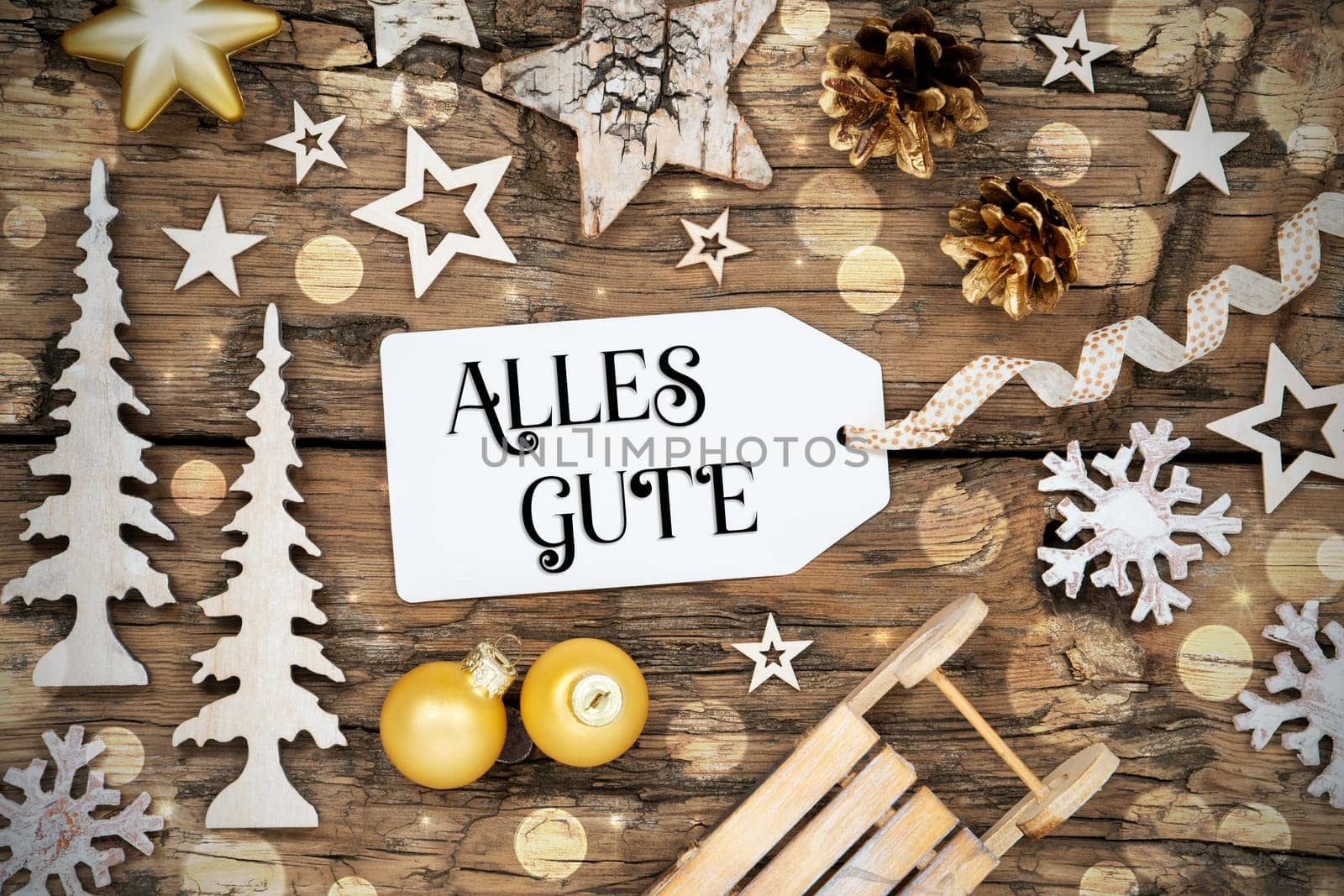 Rustic Wooden Bokeh Christmas Background, Winter Decoration With Label With German Text Alles Gute, Which Means Best Wishes In English