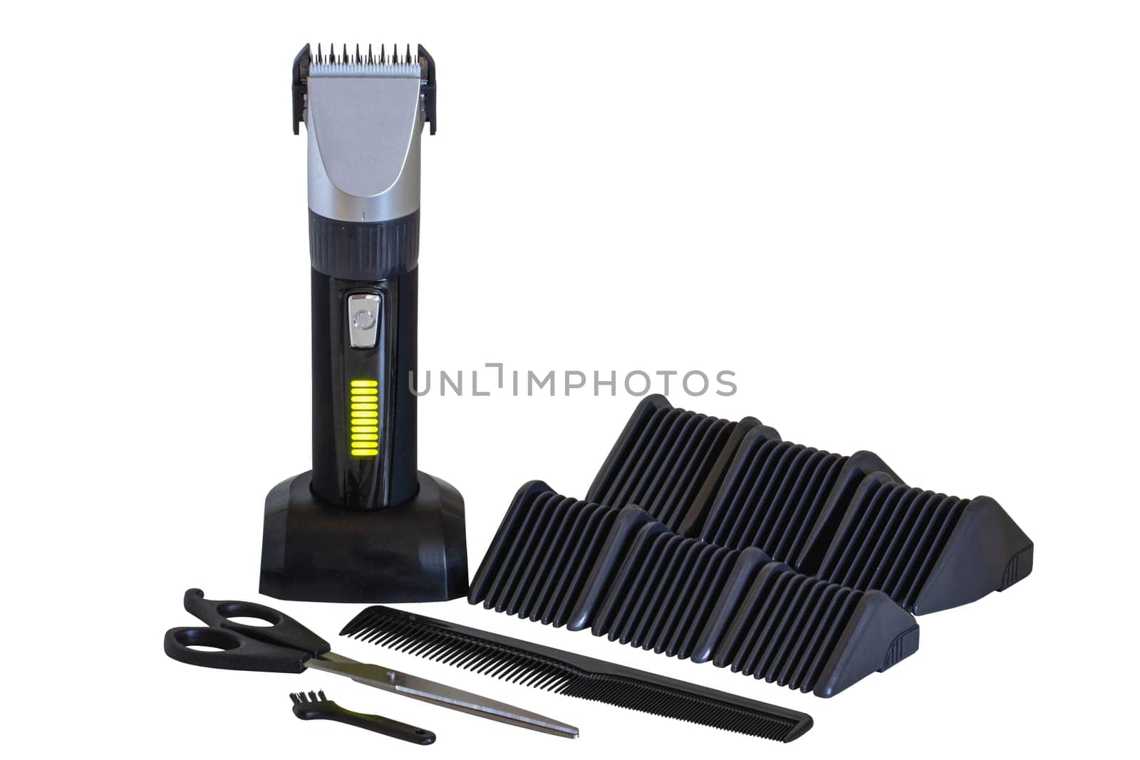 Professional hair clipper set. Rechargeable electric beard and hair clipper with comb, scissors, brush with different attachments for different hair lengths isoliert. Barber set.
