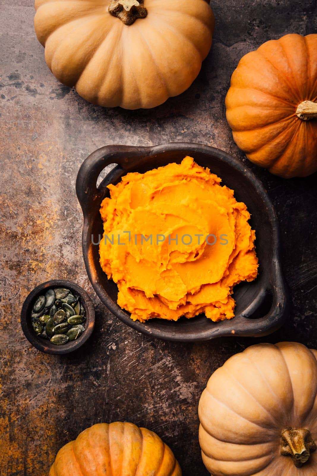 Organic Orange Pumpkin Puree. Baked butternut squash in bowl