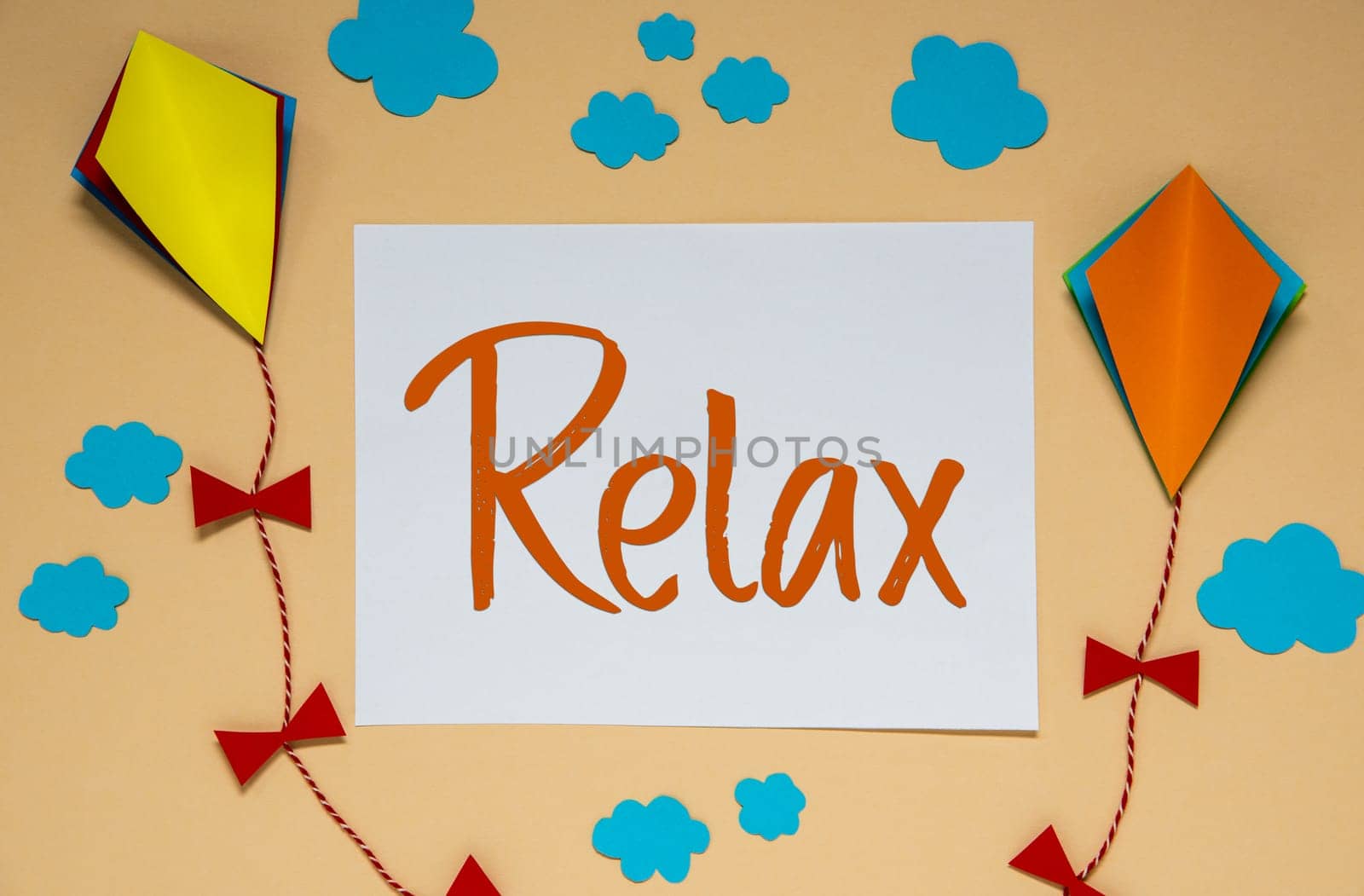 Autumn Background With Paper Kites, Clouds and Fall Decoration, With Text Relax