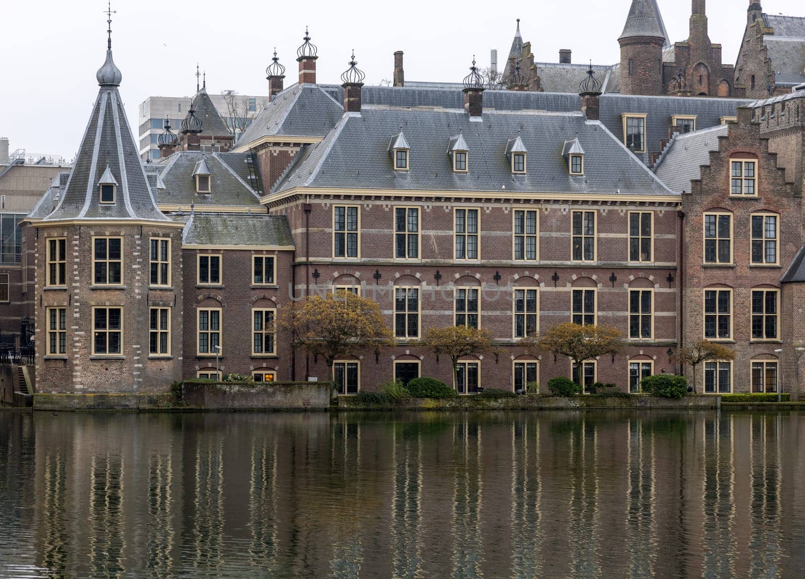 Facade of Binnenhof - Dutch Parliament with Hofvijver pond, The Hague, The Netherlands