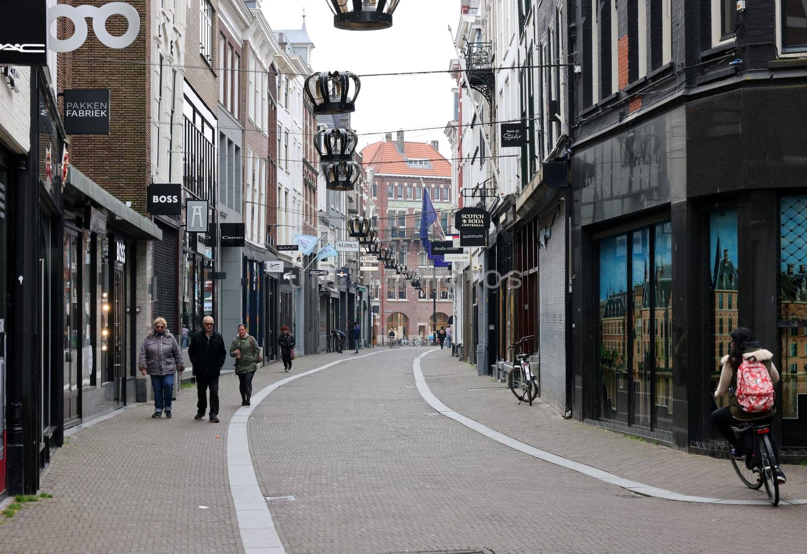 The Hague, Netherlands - April 17, 2023: Noordeinde - an elegant shopping street in The Hague, the Netherlands