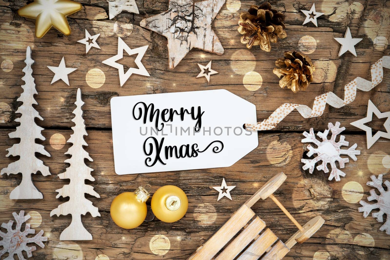 Rustic Wooden Bokeh Christmas Background, Winter Decoration With Label With Text Merry Xmas