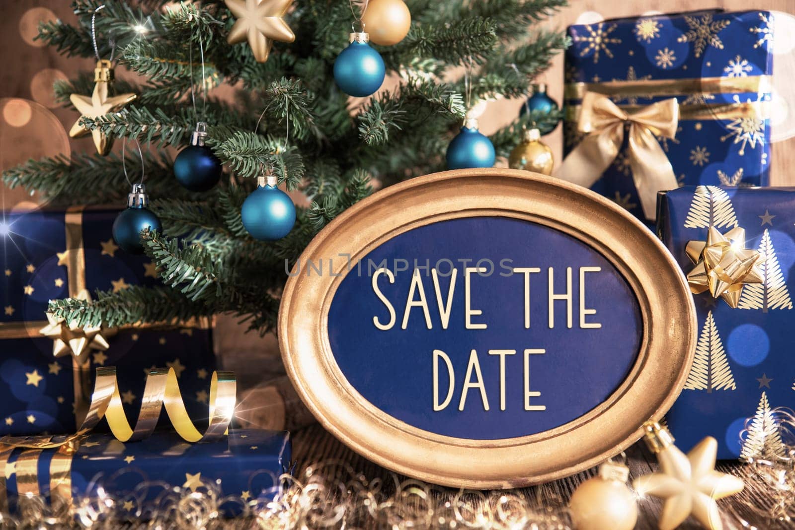 Oval Golden Frame With Text Save The Date, Blue And Golden Decorated Christmas Tree As Winter And Christmas Background