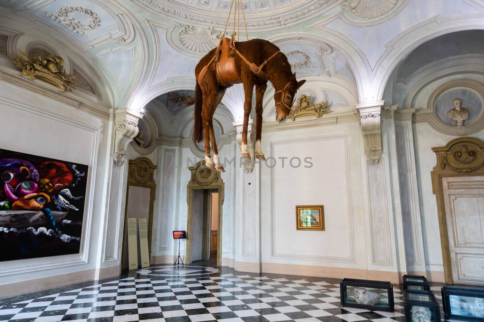 Rivoli, Italy - June 2022: Maurizio Cattelan provocative contemporary art - Novecento