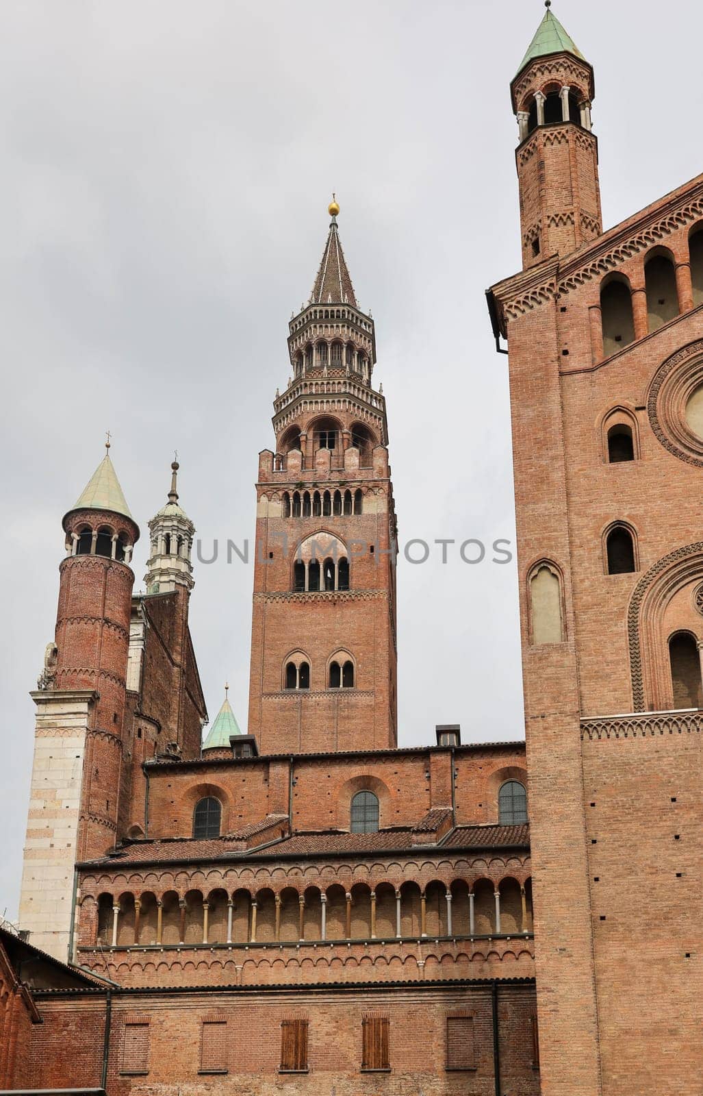 Cathedral of Cremona or Cathedral of Santa Maria Assunta and the Medieval Bell Tower of Cremona known as the Torrazzo, Lombardy, Italy.