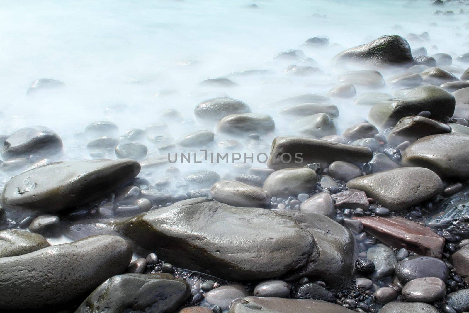 Time exposure of stones at the beach of Hellnar, Snaeffelsnes National Park