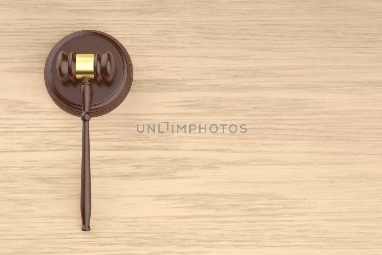 Wooden gavel on the wooden desk, top view