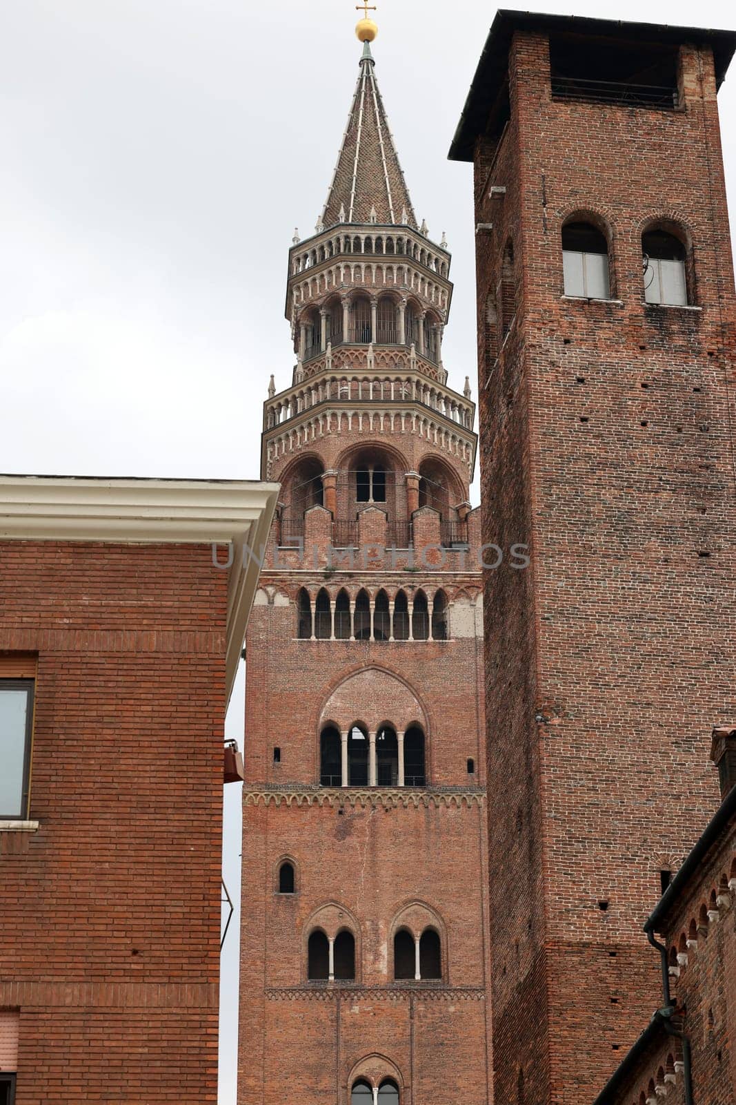 the Medieval Bell Tower of Cremona known as the Torrazzo, Lombardy, Italy.