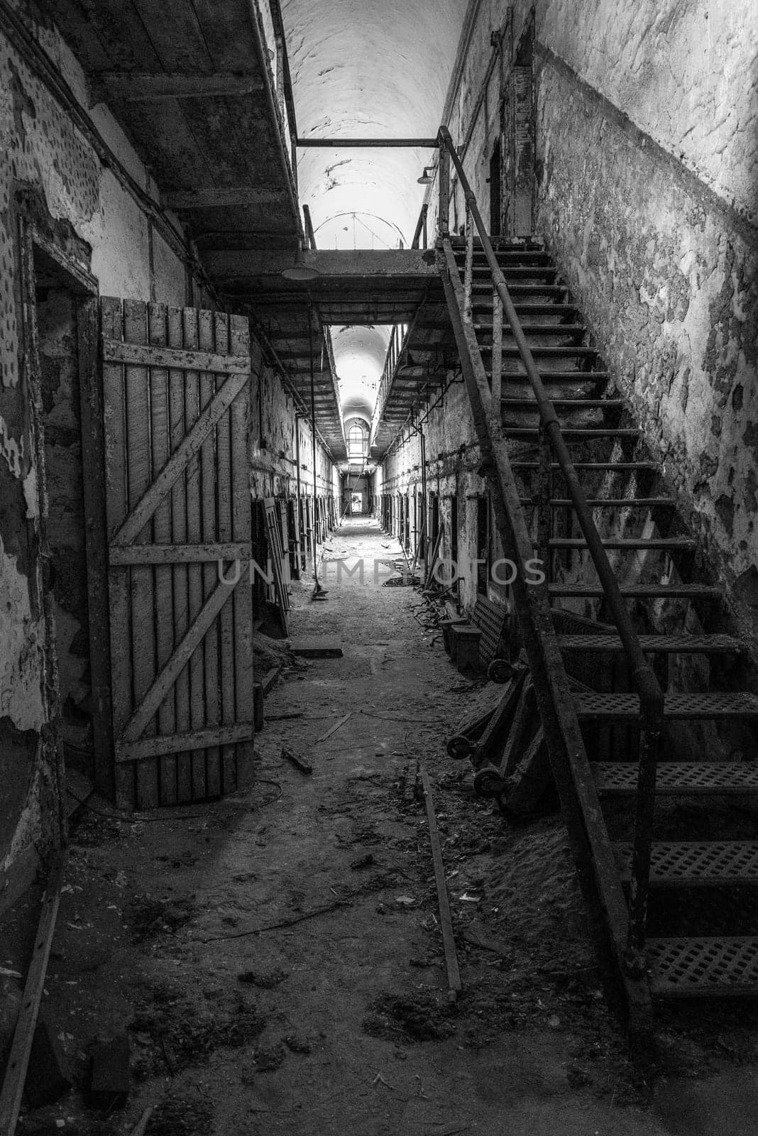 PHILADELPHIA, USA - AUGUST 15, 2022 - Abandoned corridor in the Eastern State Penitentiary in Philadelphia, USA