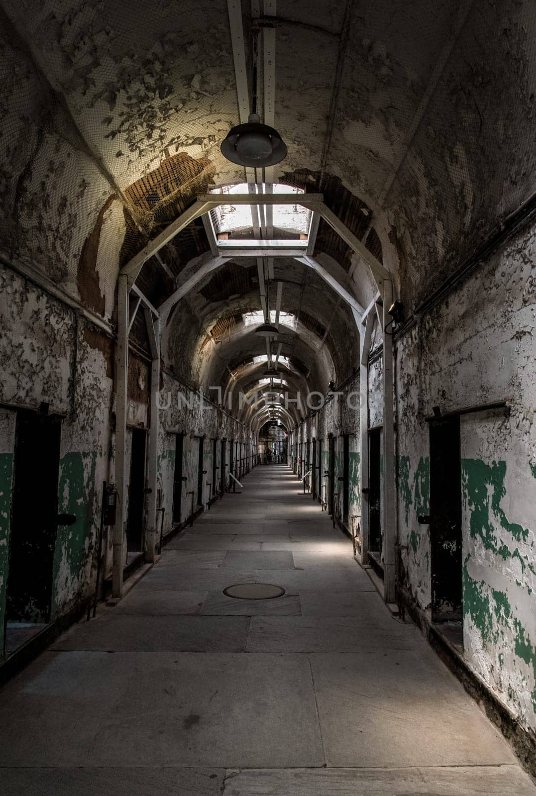 PHILADELPHIA, USA - AUGUST 15, 2022 - Abandoned corridor in the Eastern State Penitentiary in Philadelphia, USA
