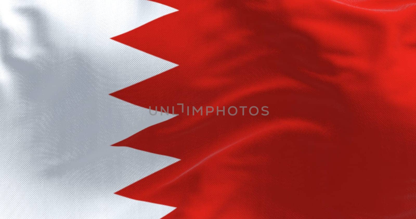 Close-up of National flag of Bahrain waving. White band on the left and a red area on the right, separated by five triangles forming a serrated line. 3d illustration render. Fluttering fabric