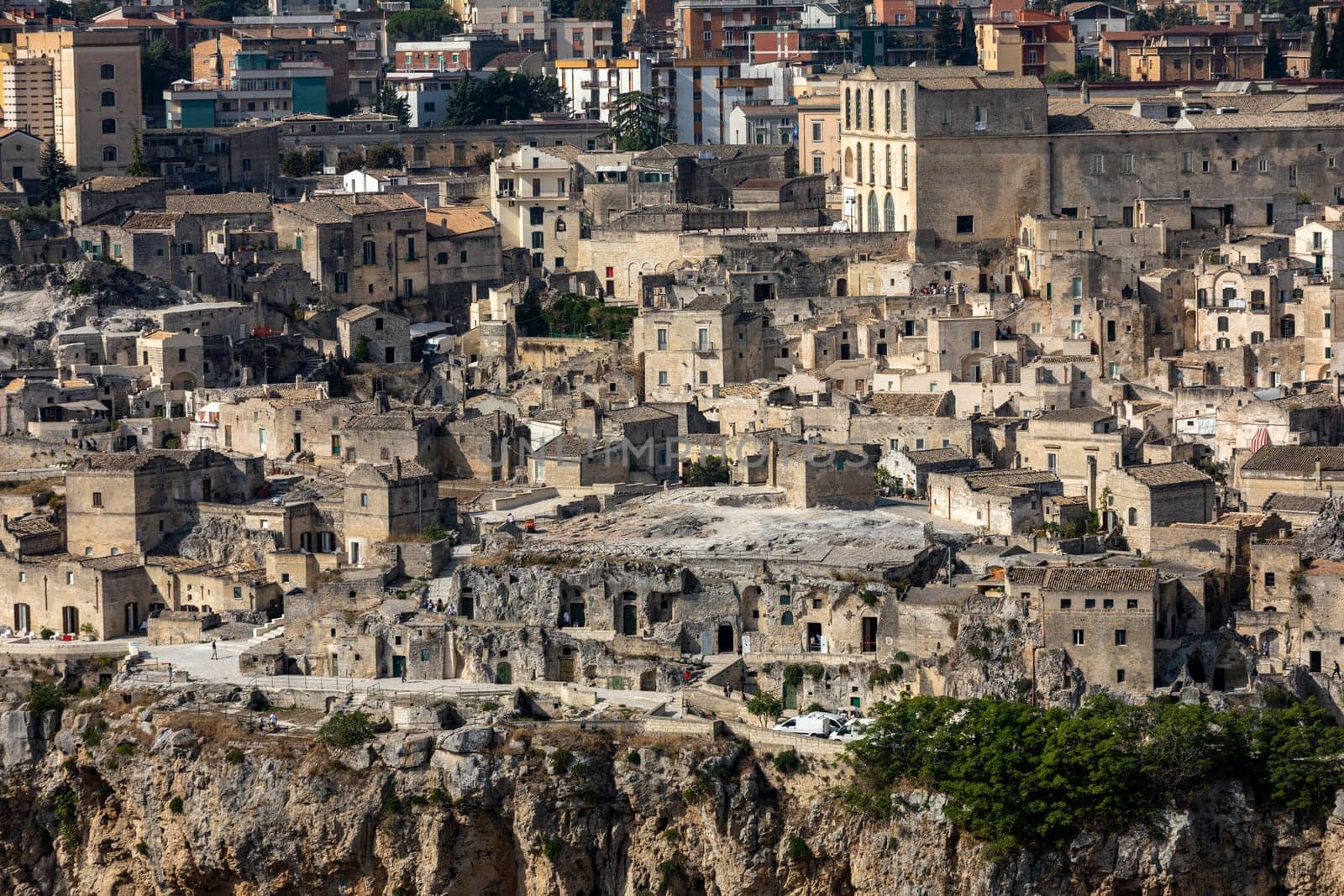 Panoramic view of Sassi di Matera a historic district in the city of Matera, well-known for their ancient cave dwellings from the Belvedere di Murgia Timone,  Basilicata, Italy