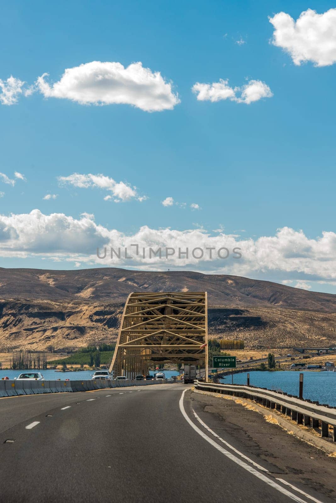 The huge Columbia river in Washington state, dry landscape surrounding the water, USA
