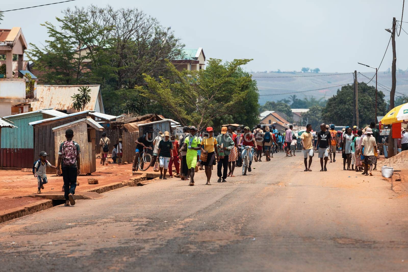 Mandoto, Madagascar - November 9th, 2022: Local residents walking and going about their daily lives on Mandoto street in Madagascar.