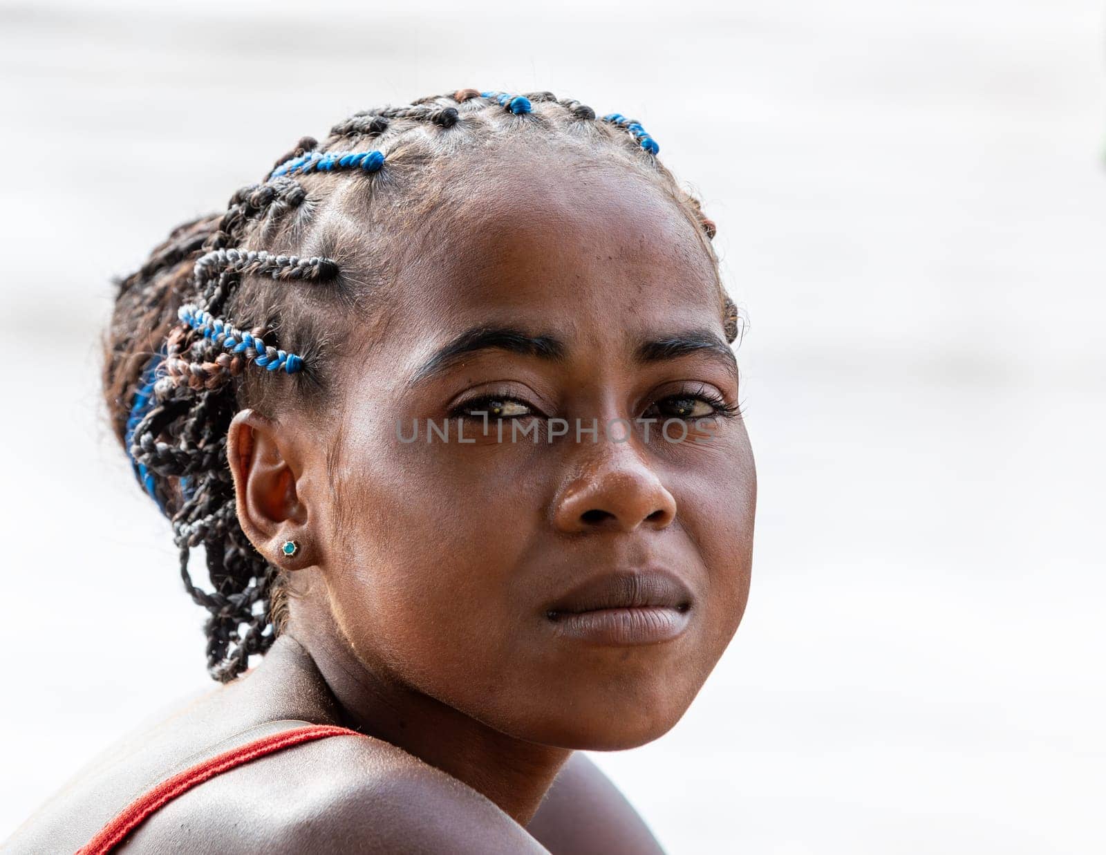 Andadoany, Bekopaka, Madagascar - November 4. 2022: Portrait of beautiful Malagasy woman in ferry on river Mania.