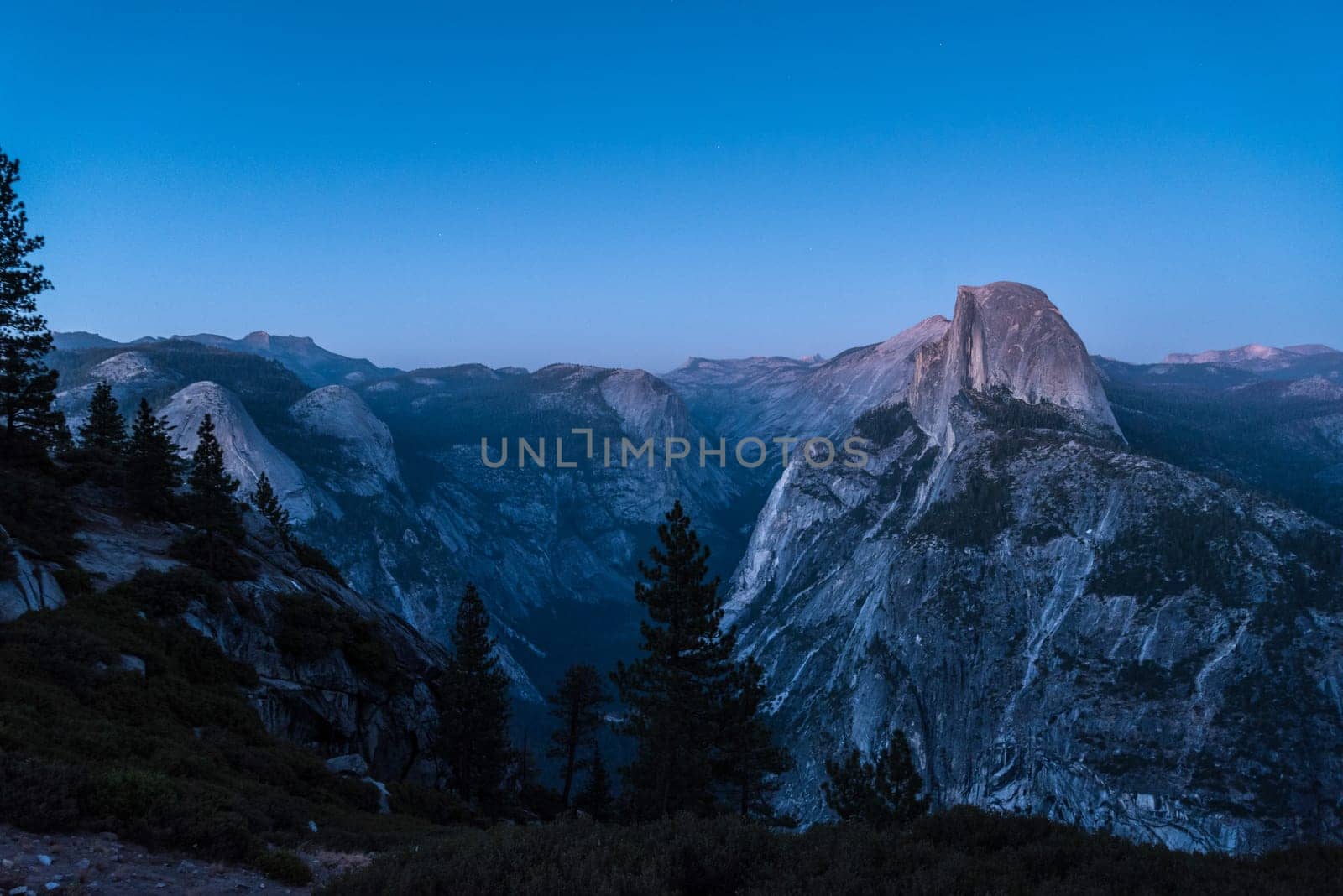 Scenic night sky above the famous Half Dome mountain, Yosemite NP, USA