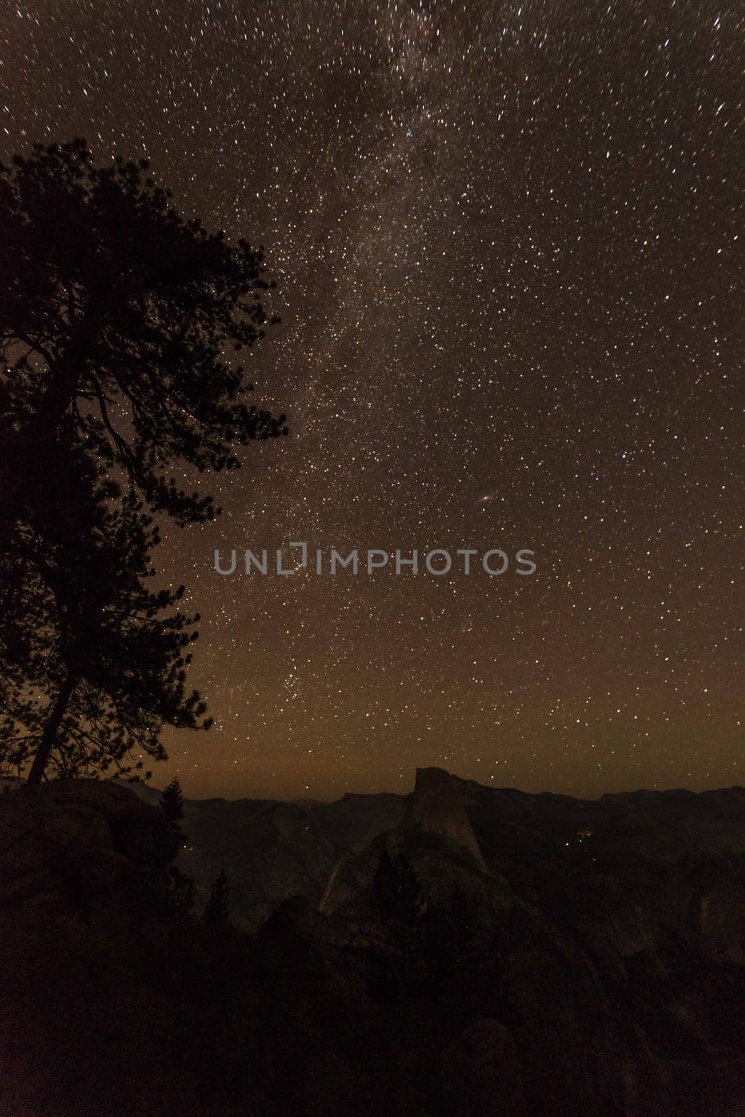 Scenic night sky above the famous Half Dome mountain, Yosemite NP, USA
