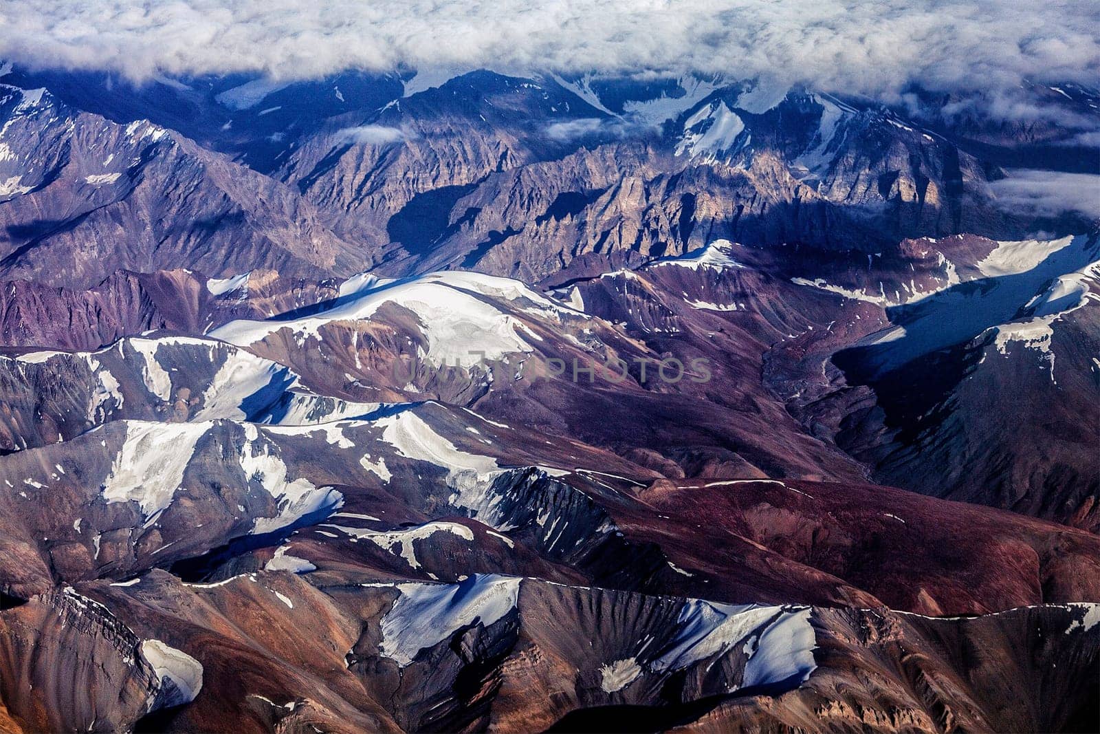 Himalayas mountains aerial view with clouds