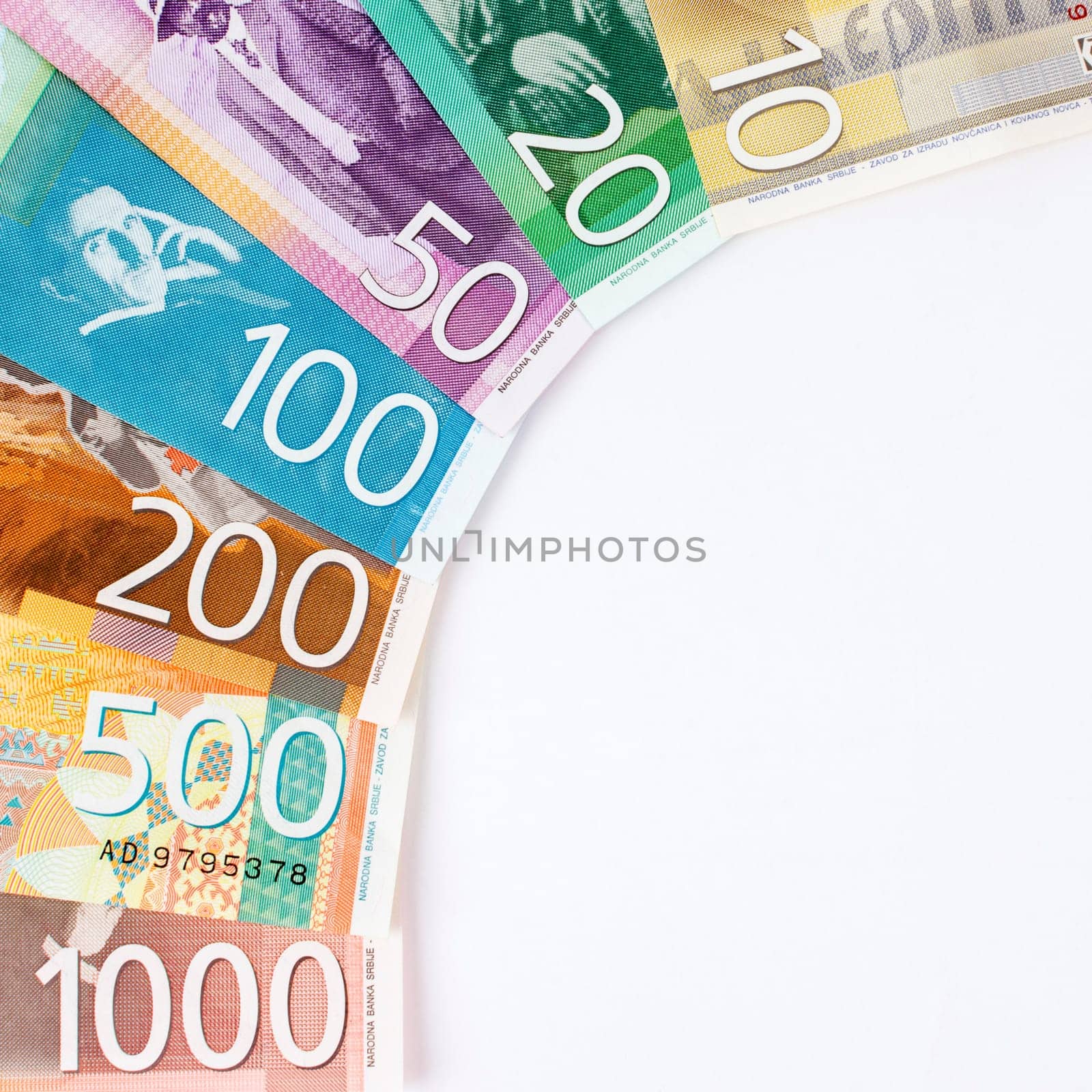 Colorful Serbian dinar banknotes, paper currency, money on white background.