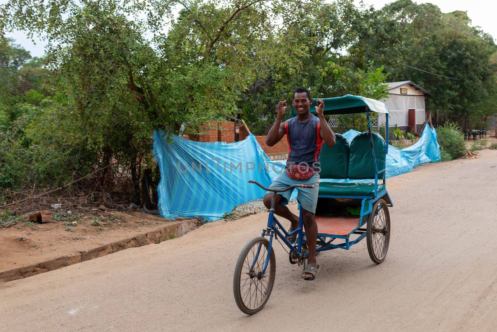 Miandrivazo, Madagascar - November 2nd 2022: A traditional rickshaw on the city streets, serving as a cultural emblem and a mode of transport.