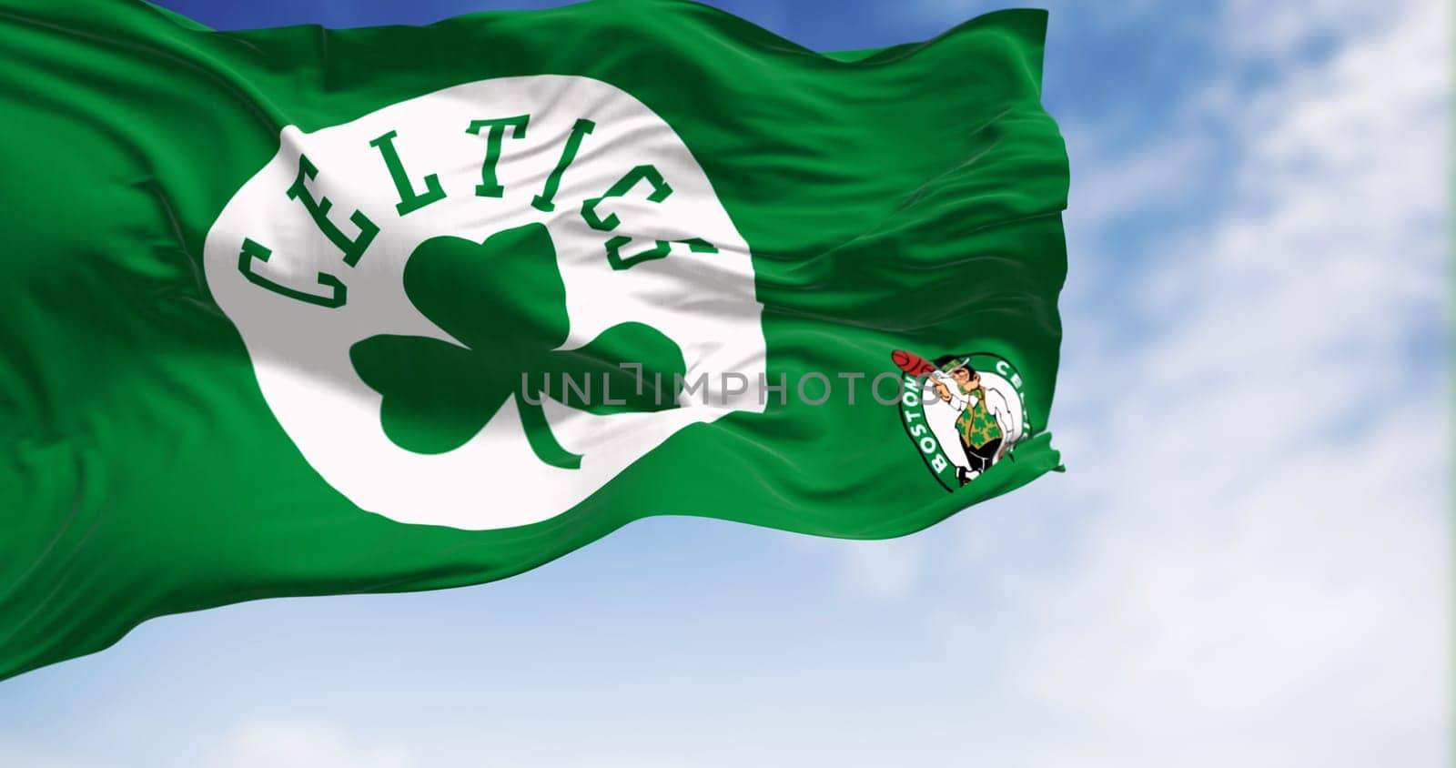 Flag of Celtics Boston waving in the wind on a clear day. American professional basketball team, member of the Eastern Conference Atlantic Division. Illustrative editorial 3d illustration render